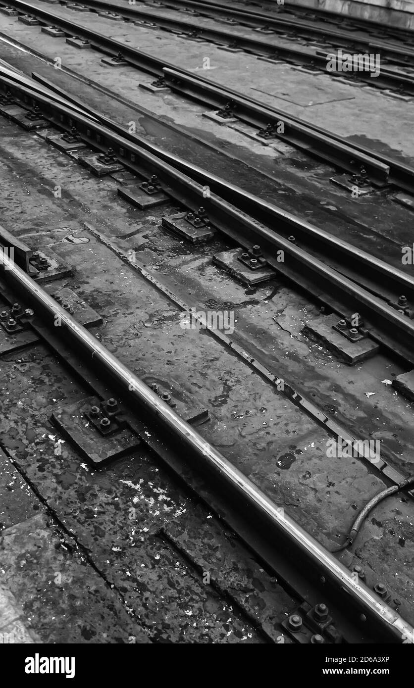 Old metal tracks of a train, detail of ground transportation, travel Stock Photo