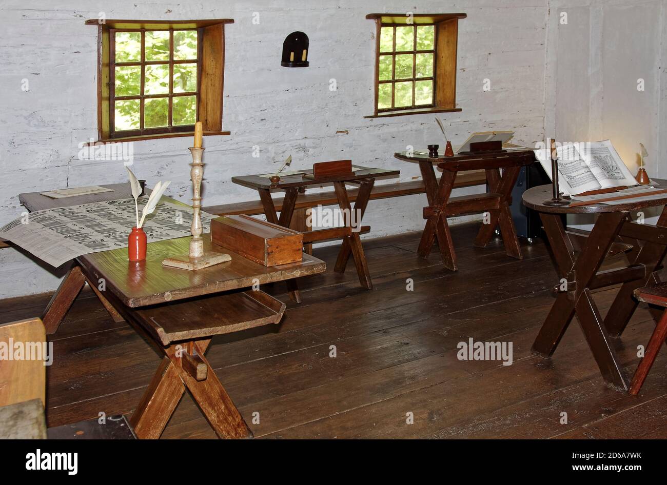 old workroom; wood writing desks; benches; quill pens; women's house; Saron; Ephrata Cloister, 1743, Lancaster County, Pennsylvania; Ephrata; PA Stock Photo