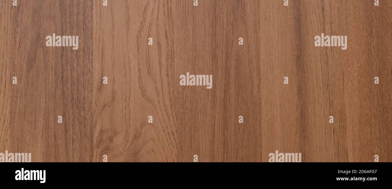 Wood texture background. Natural brown laminate flooring banner. Stock Photo