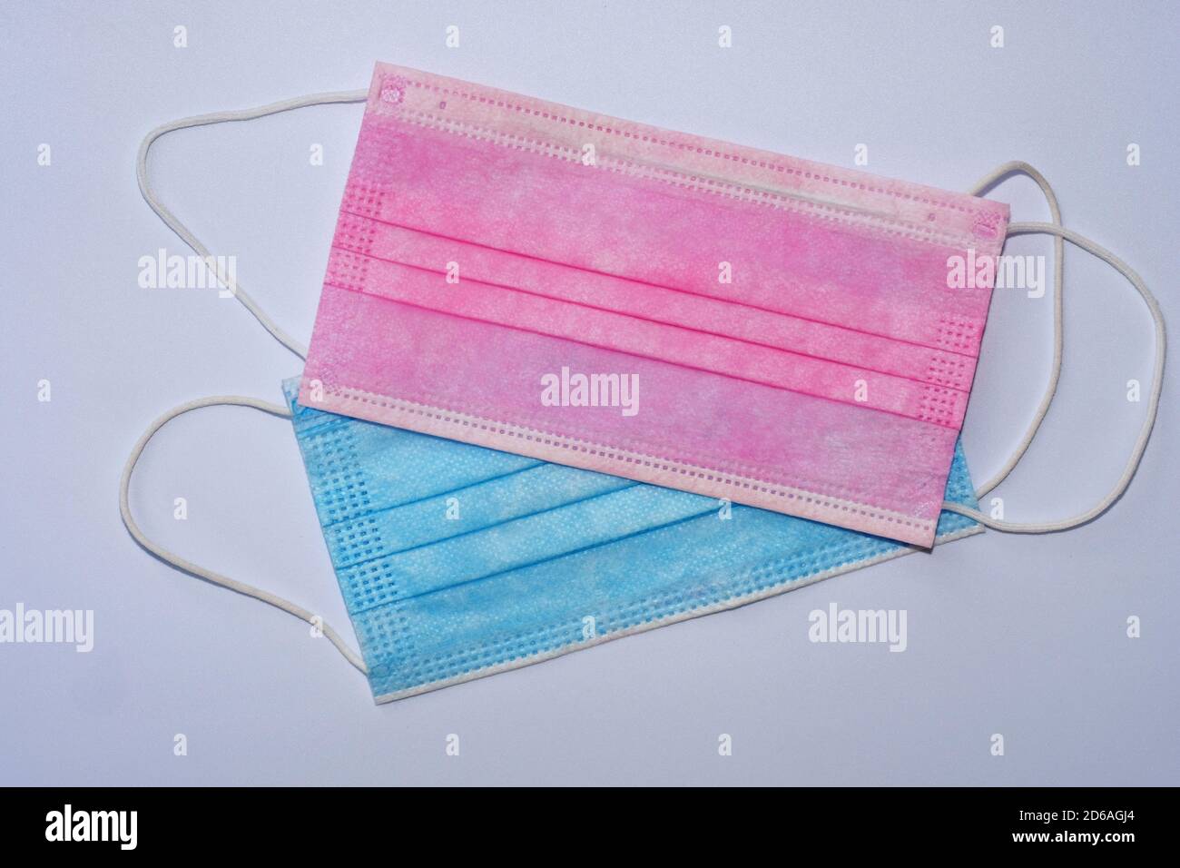 pink and blue face masks