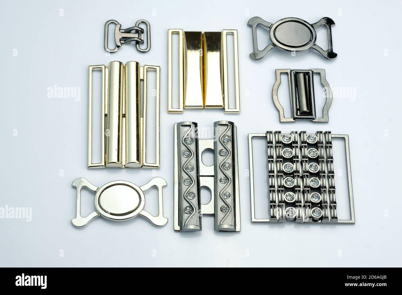 Detachable buckle for making belts for dresses, skirts. Decorative buckles  for swimwear. Metal fittings with rhinestones for decorating women's clothi  Stock Photo - Alamy