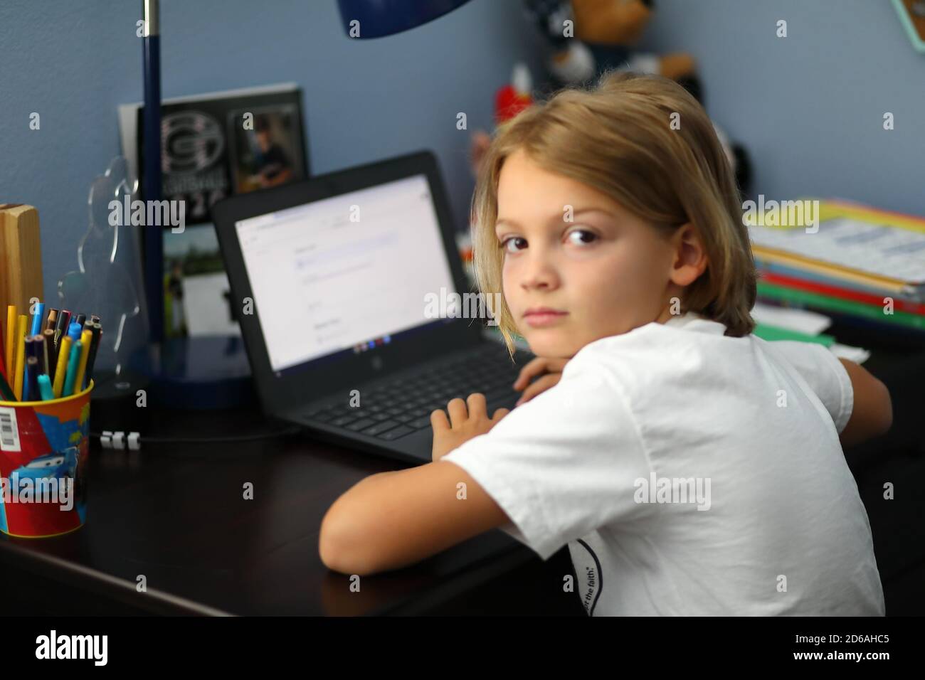 School from home via Zoom on a Chromebook Stock Photo