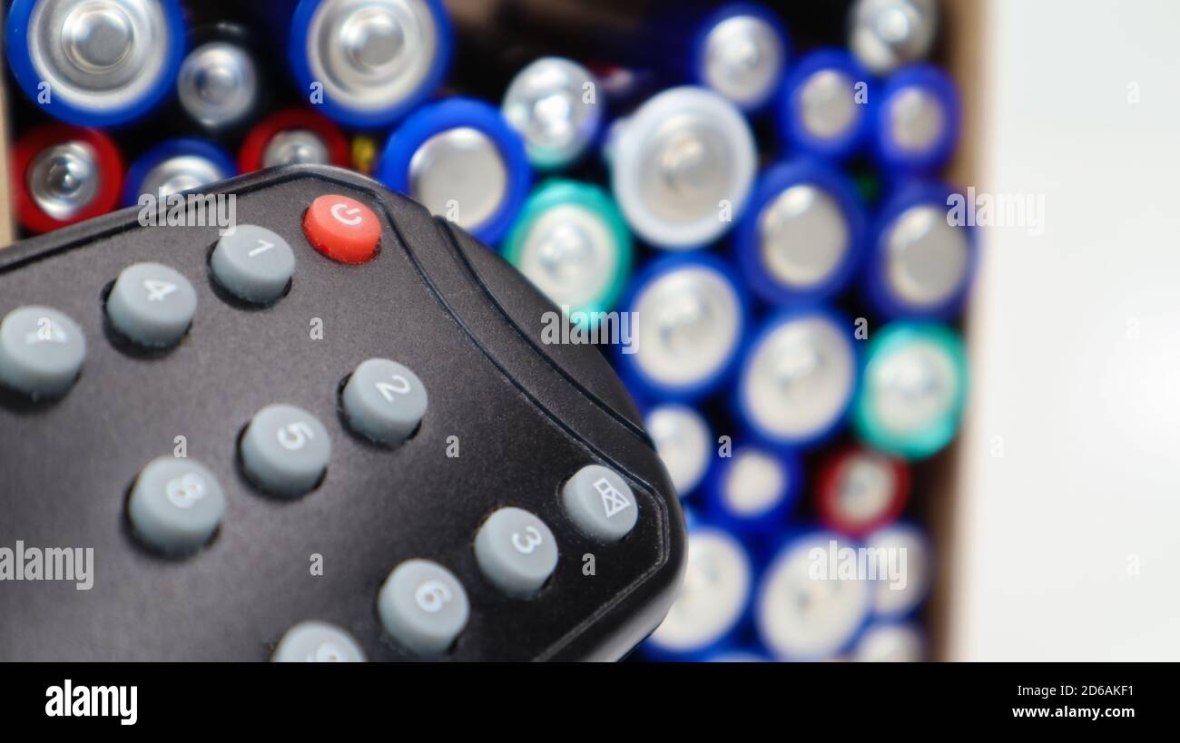 TV remote control with disposable AAA and AA alkaline batteries