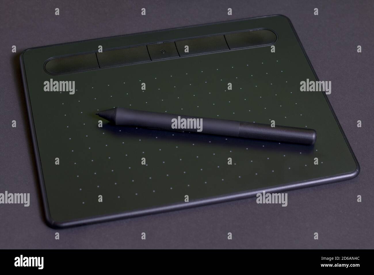 Graphic tablet on a black background. Stock Photo