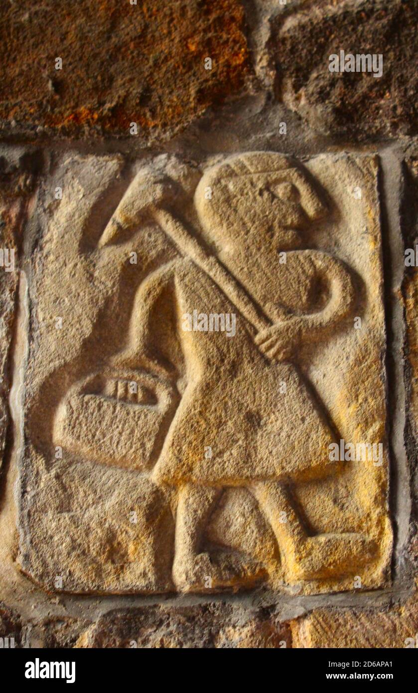 T'owd Man of Bonsall, an ancient carving of a lead miner in St Mary's church Wirksworth, Derbyshire. Stock Photo