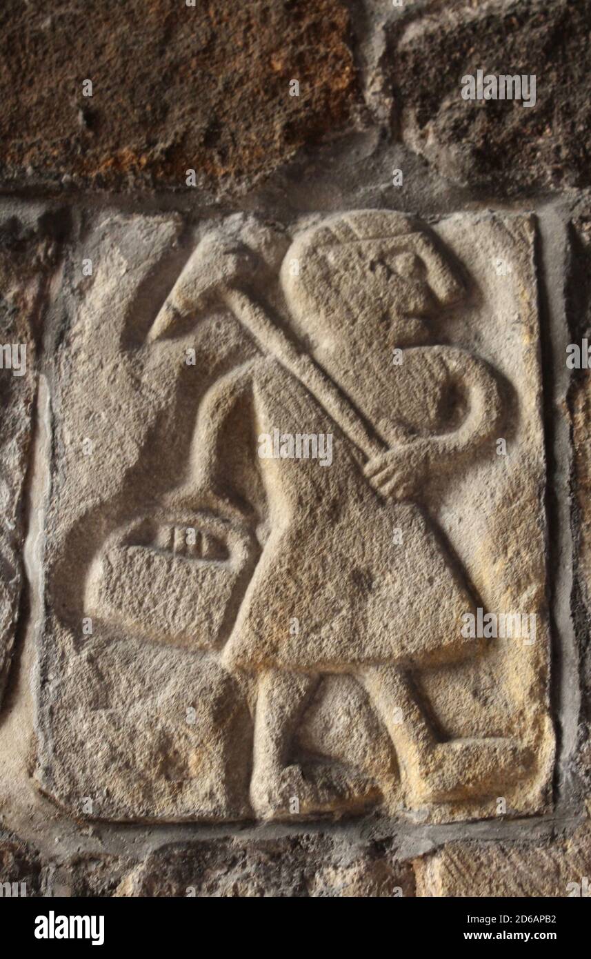 T'owd Man of Bonsall, an ancient carving of a lead miner in St Mary's church Wirksworth, Derbyshire. Stock Photo