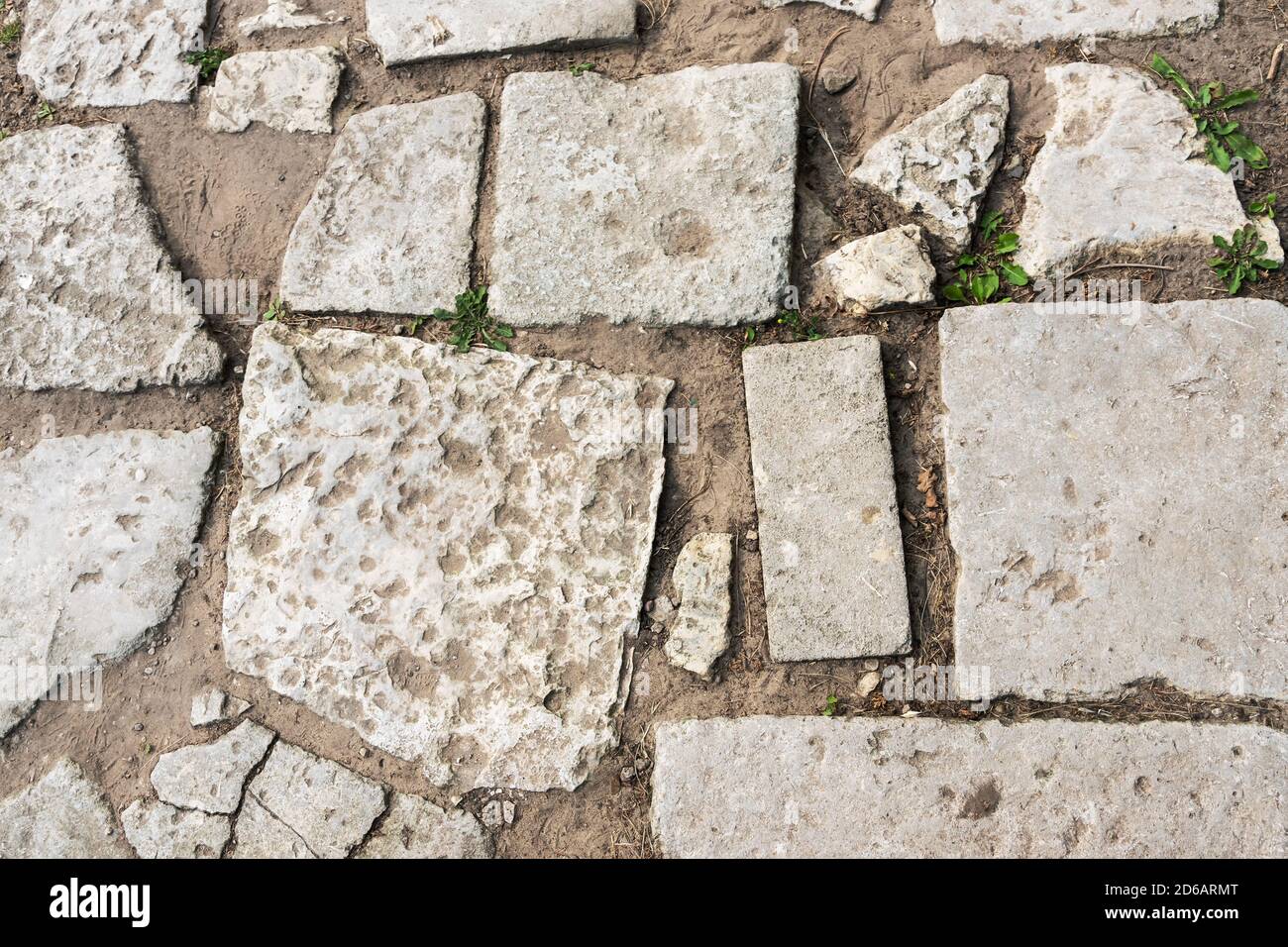 Stone paving of road, path paved with cobblestone Stock Photo