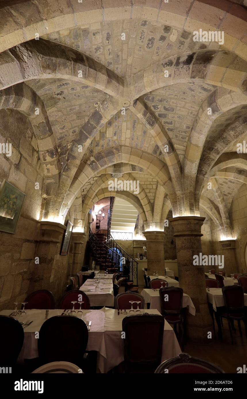 Interior view of La Table des Gourmets a restaurant serving traditional French cuisine in a 12th century chapel in Chatelet and Marais district.Paris.France Stock Photo