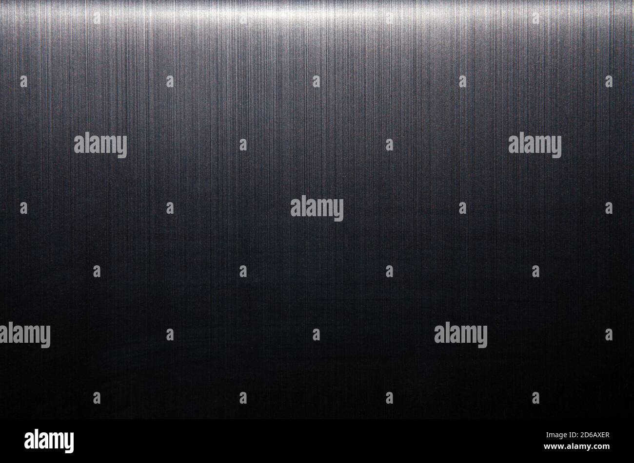 Metallic wall background, texture. Grey or dark-gray smooth painted surface. Stock Photo