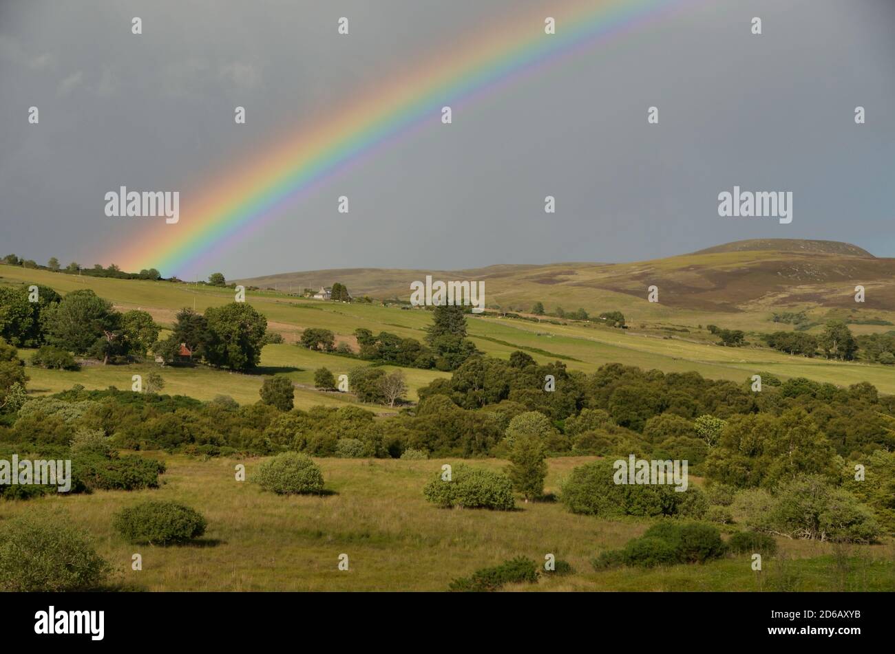 A rainbow over the countryside near Bonar Bridge, Scottish Highlands Stock Photo