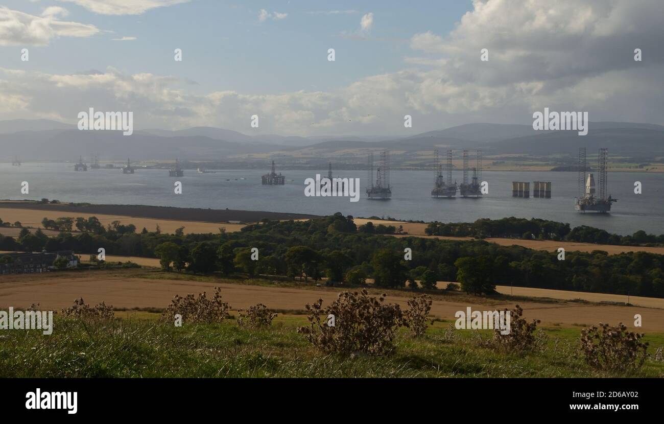 North Sea oil rigs laid up in the Cromarty Firth on the east coast of Scotland during the covid-19 pandemic, 2020. Stock Photo