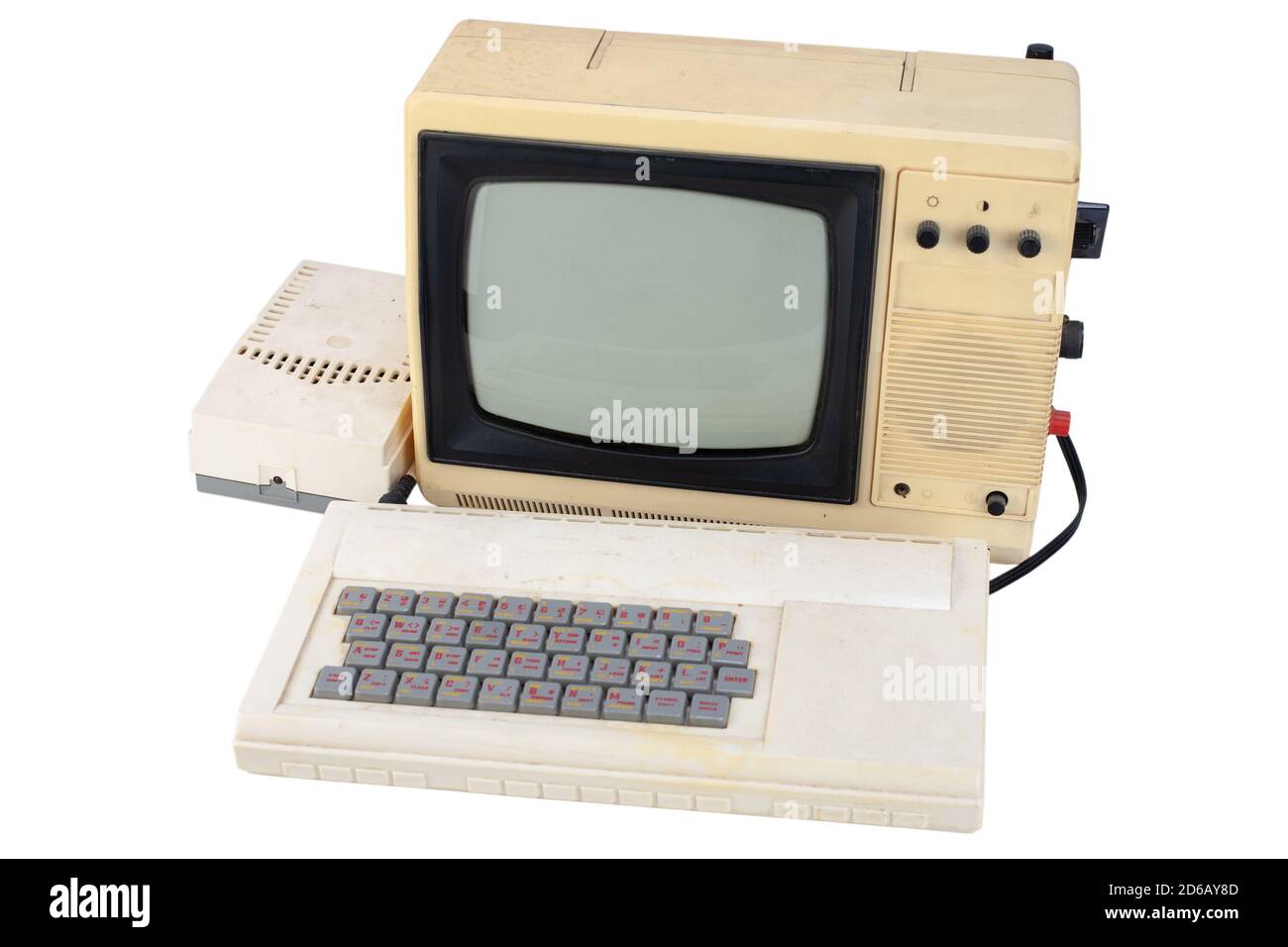 old 8 bit computer with monitor from tv set isolated on white Stock Photo
