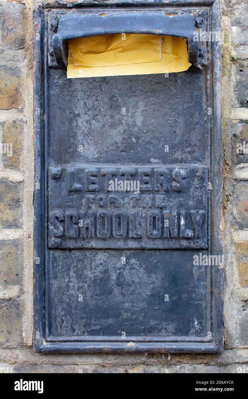 Vintage letterbox on wall of primary school in Chelsea, London Stock Photo