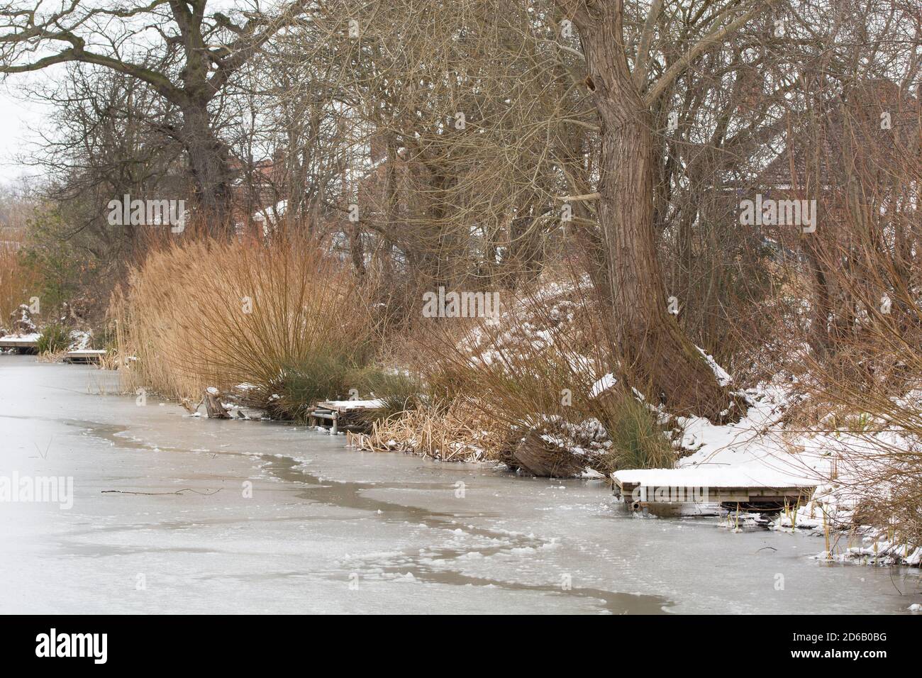 Frozen over fishing lake image Stock Photo Alamy