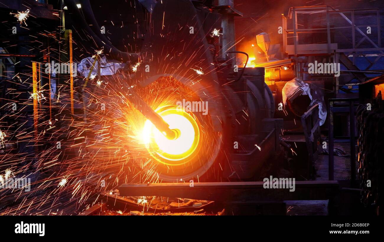 Iron pipe centrifugal pipe casting machine at the foundry Stock Photo