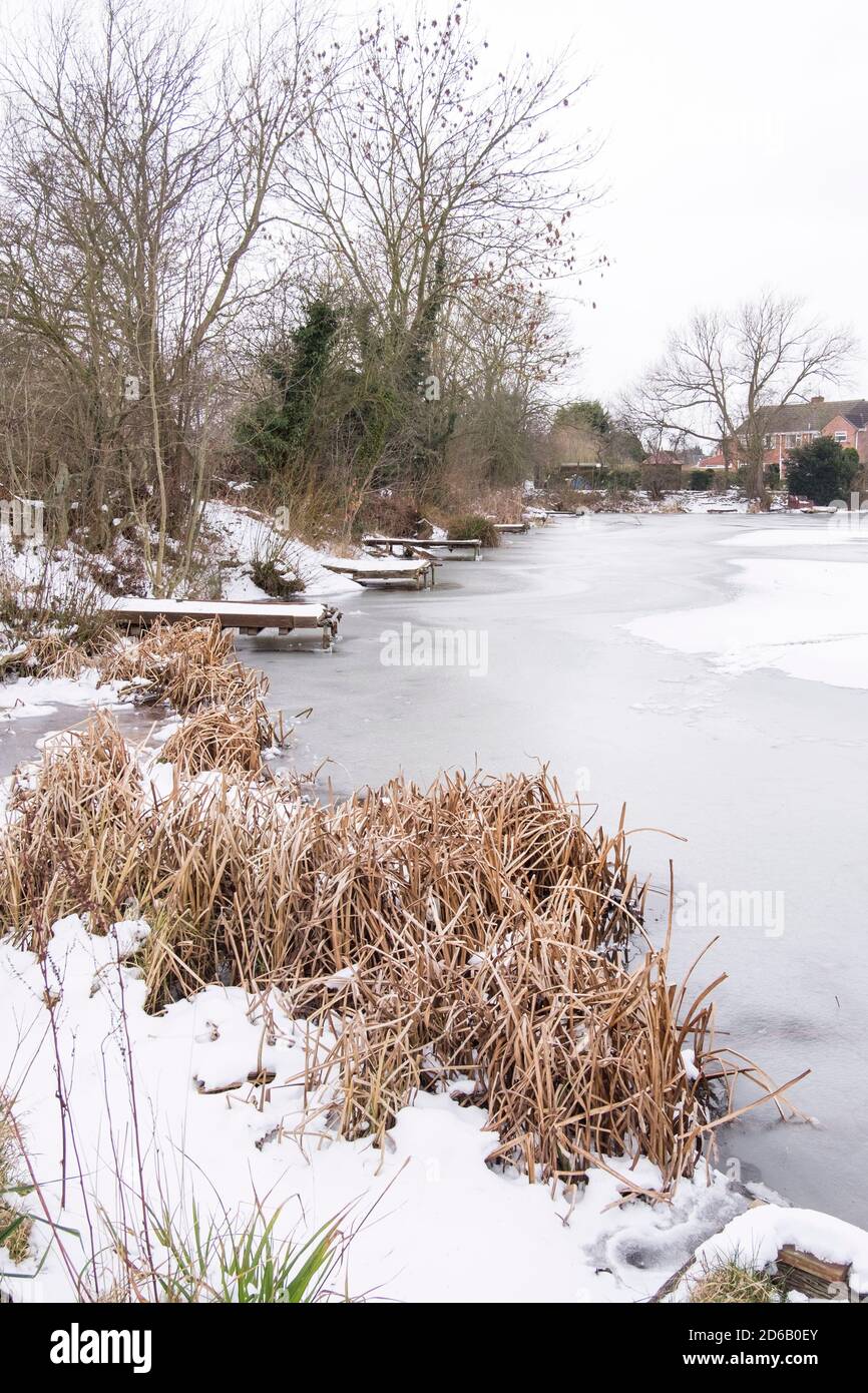 Frozen over fishing lake image Stock Photo Alamy