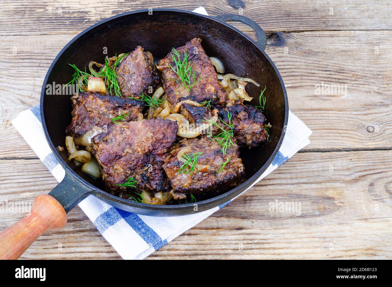 Meat dishes from liver. Fried beef, veal liver in pan Stock Photo Alamy