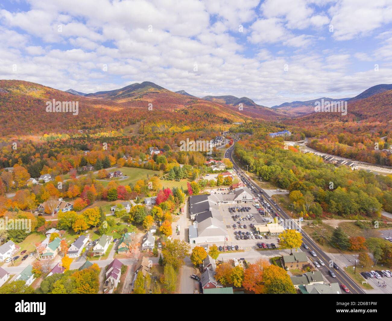 Lincoln Main Street at town center and Little Coolidge Mountain on Kancamagus Highway aerial view with fall foliage, Town of Lincoln, New Hampshire NH Stock Photo