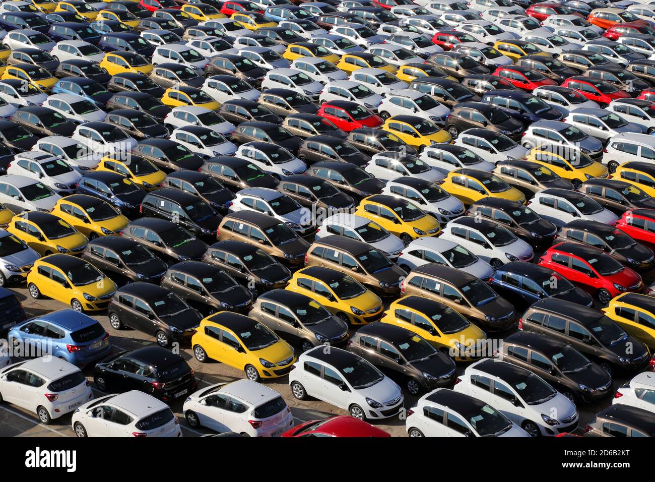 Large parking lot of new cars waiting for delivery and export, at Barcelona  Port Stock Photo - Alamy