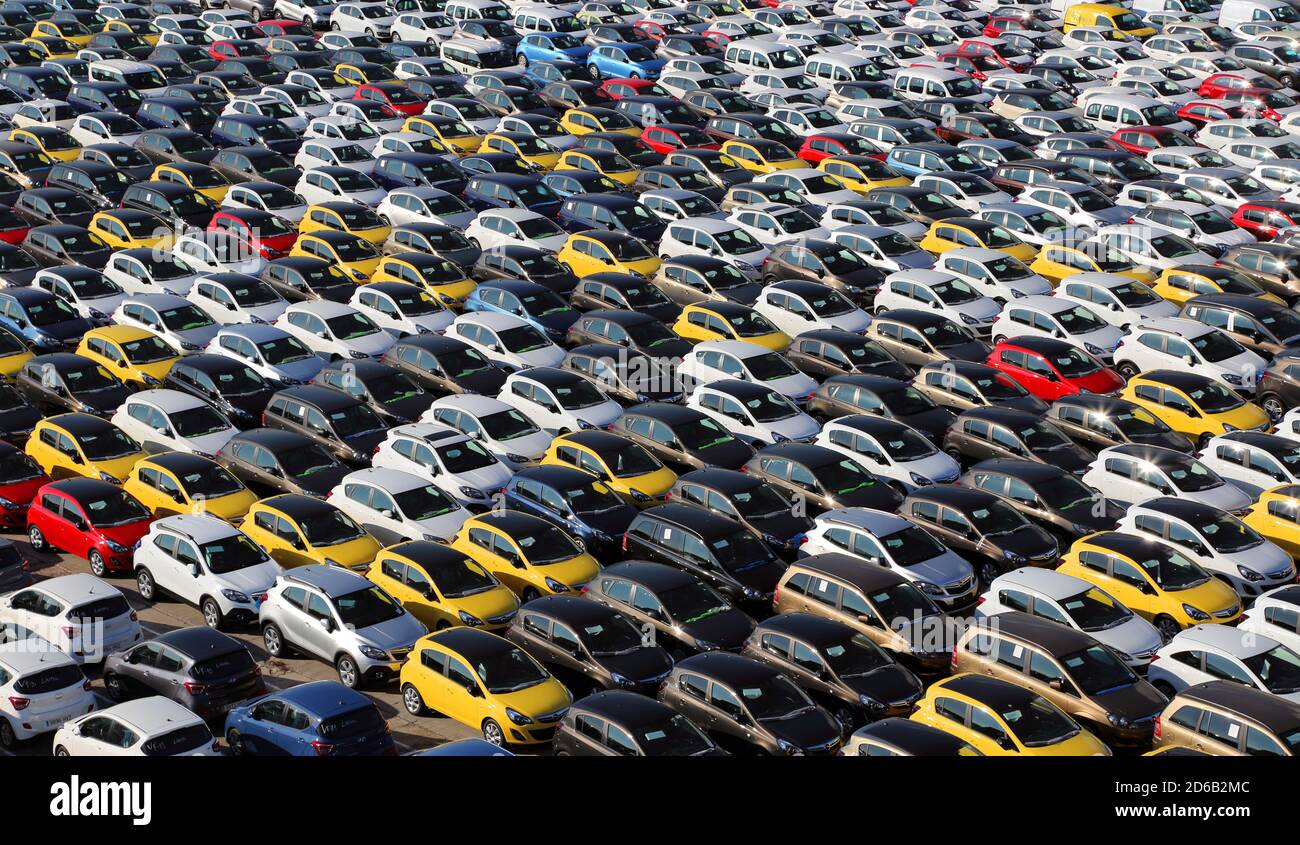 Large parking lot of new cars waiting for delivery and export, at