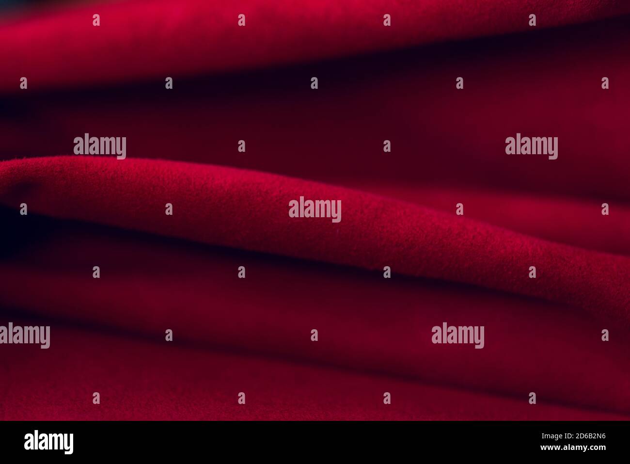 Red Suede Pattern Red matte background of suede fabric, closeup. Velvet texture of ...