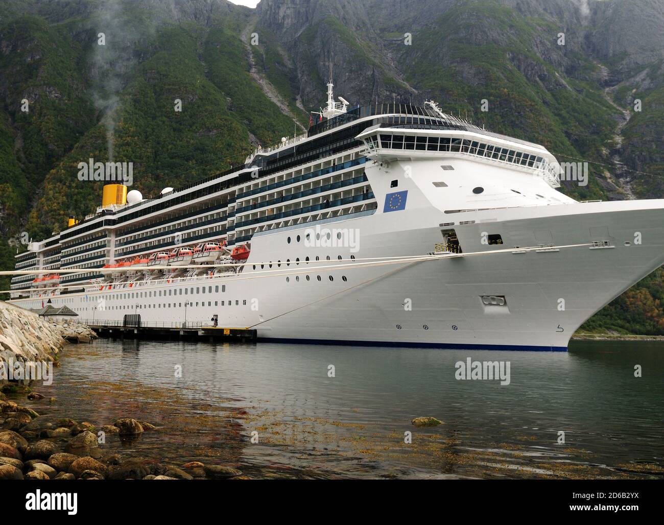 Large Cruiser Anchoring In Eidfjord On An Overcast  Summer Day Stock Photo