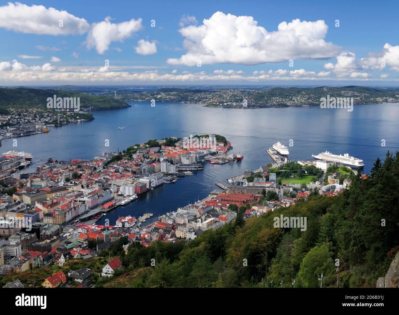 Spectacular View From Mount Floyen To The Harbour Of Bergen And The Byfjord On A Sunny Summer Day With A Clear Blue Sky And A Few Clouds Stock Photo