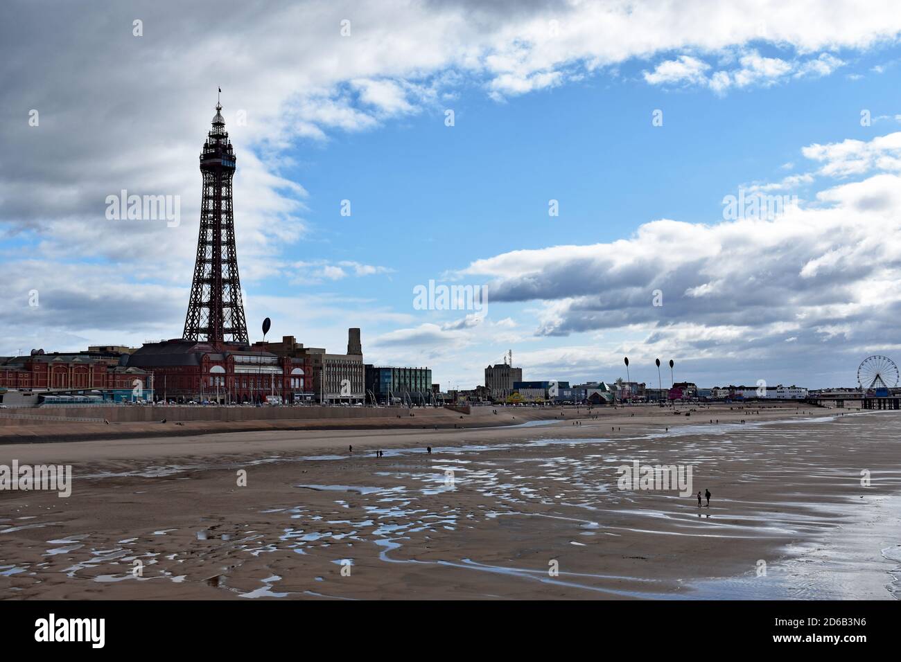 Blackpool's famous seafront and promenade featuring the Blackpool Tower and Central Pier complete with a ferris wheel.  Lancashire, England. Stock Photo