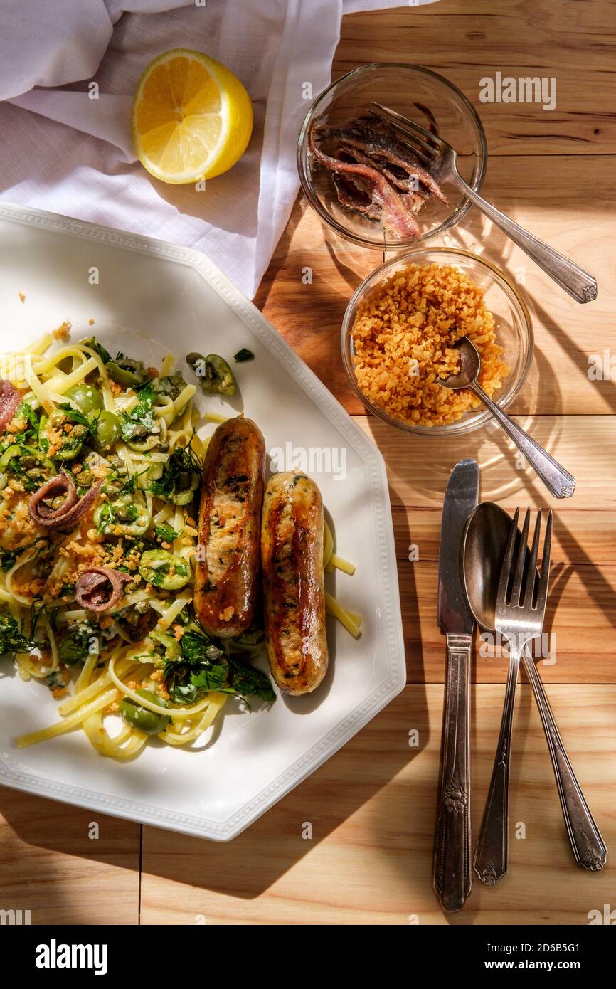 Italian chicken spinach sausage and linguine with herbed green castelvetrano olive sauce