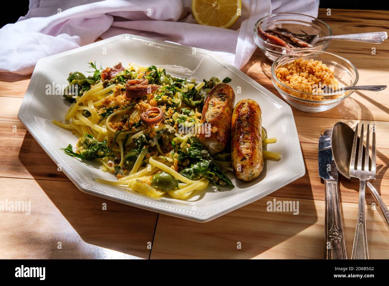 Italian chicken spinach sausage and linguine with herbed green castelvetrano olive sauce