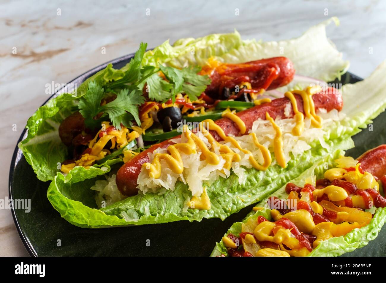 Glutenfree diet nobun hot dog lettuce wraps Stock Photo Alamy