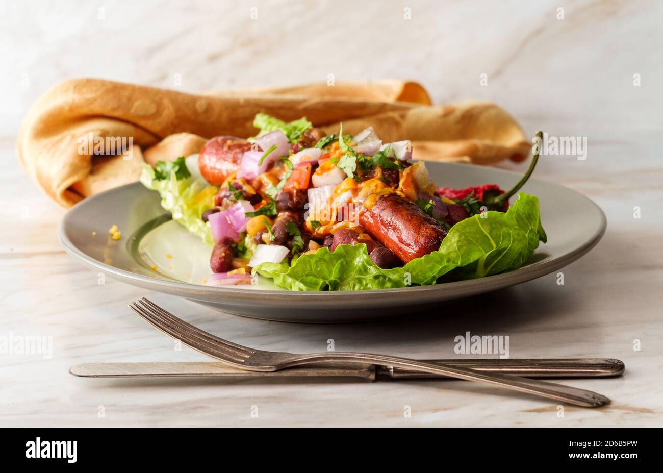 Fancy glutenfree diet nobun chili hot dog lettuce wraps Stock Photo