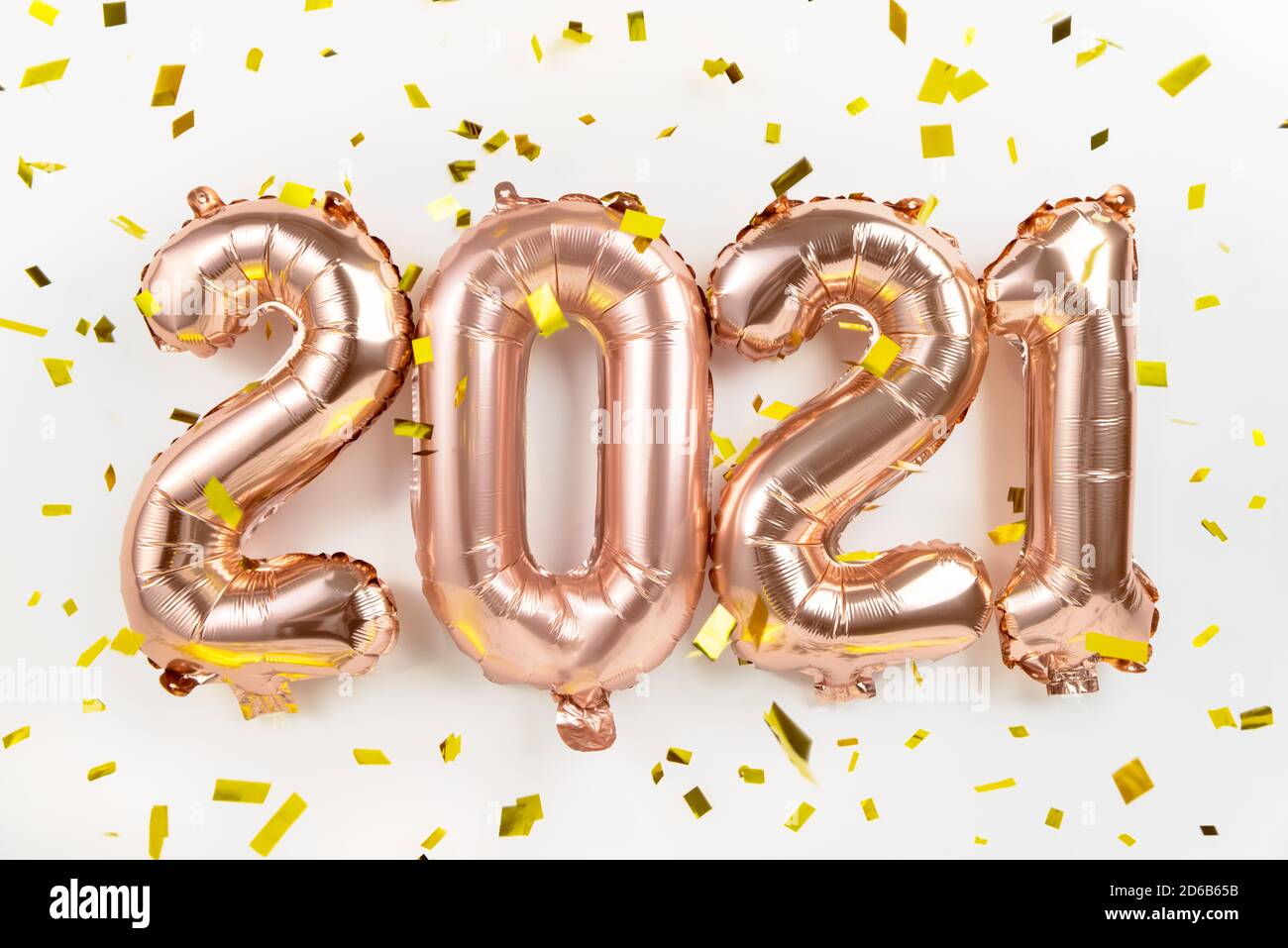 Foil balloons numeral 2021 and confetti Stock Photo