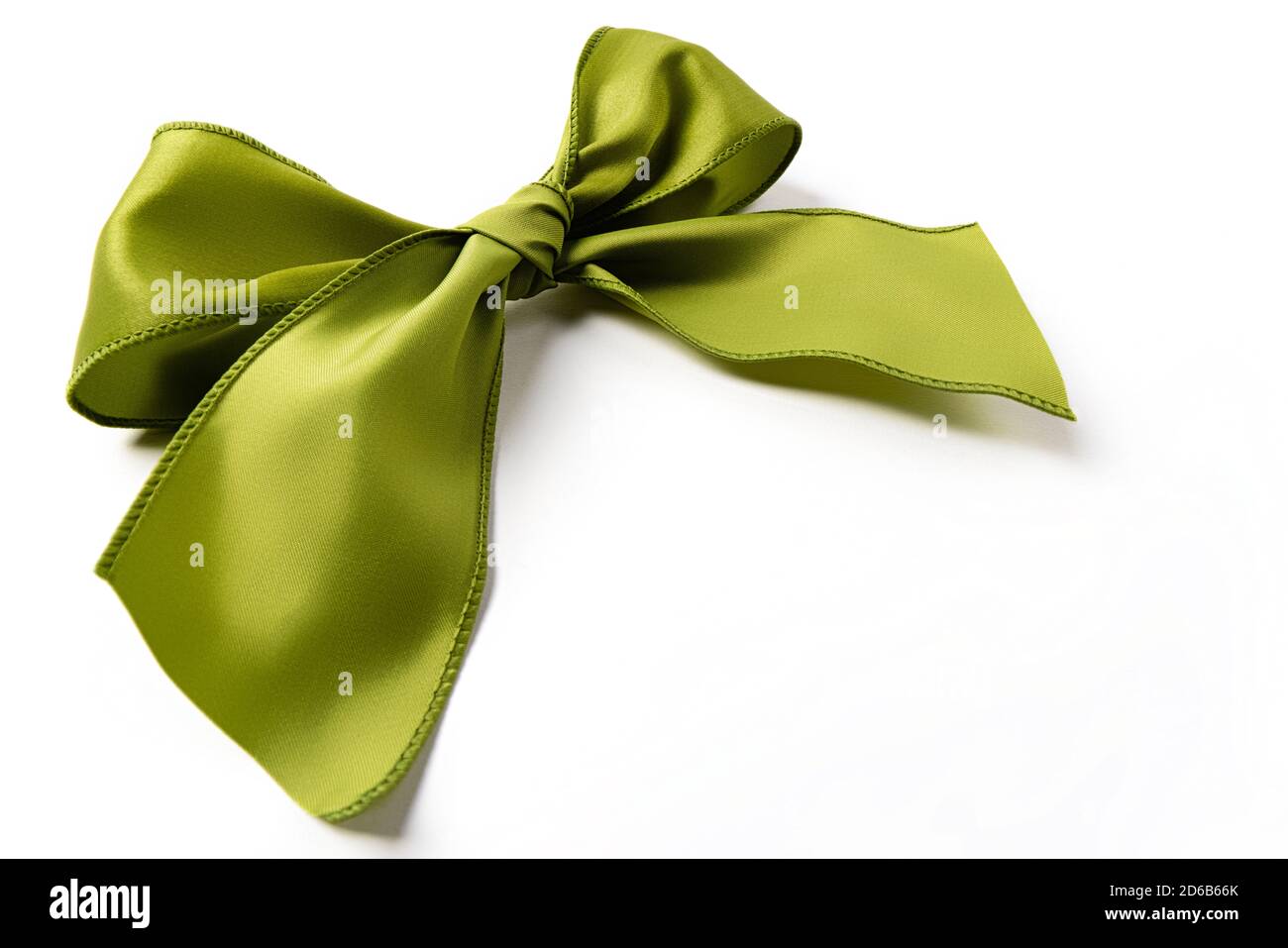 Green gift bow on white background Stock Photo
