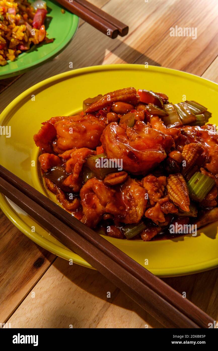 Takeout Chinese Kung Pao Chicken And Shrimp With Peanuts And Side Of Pork Fried Rice Stock Photo Alamy