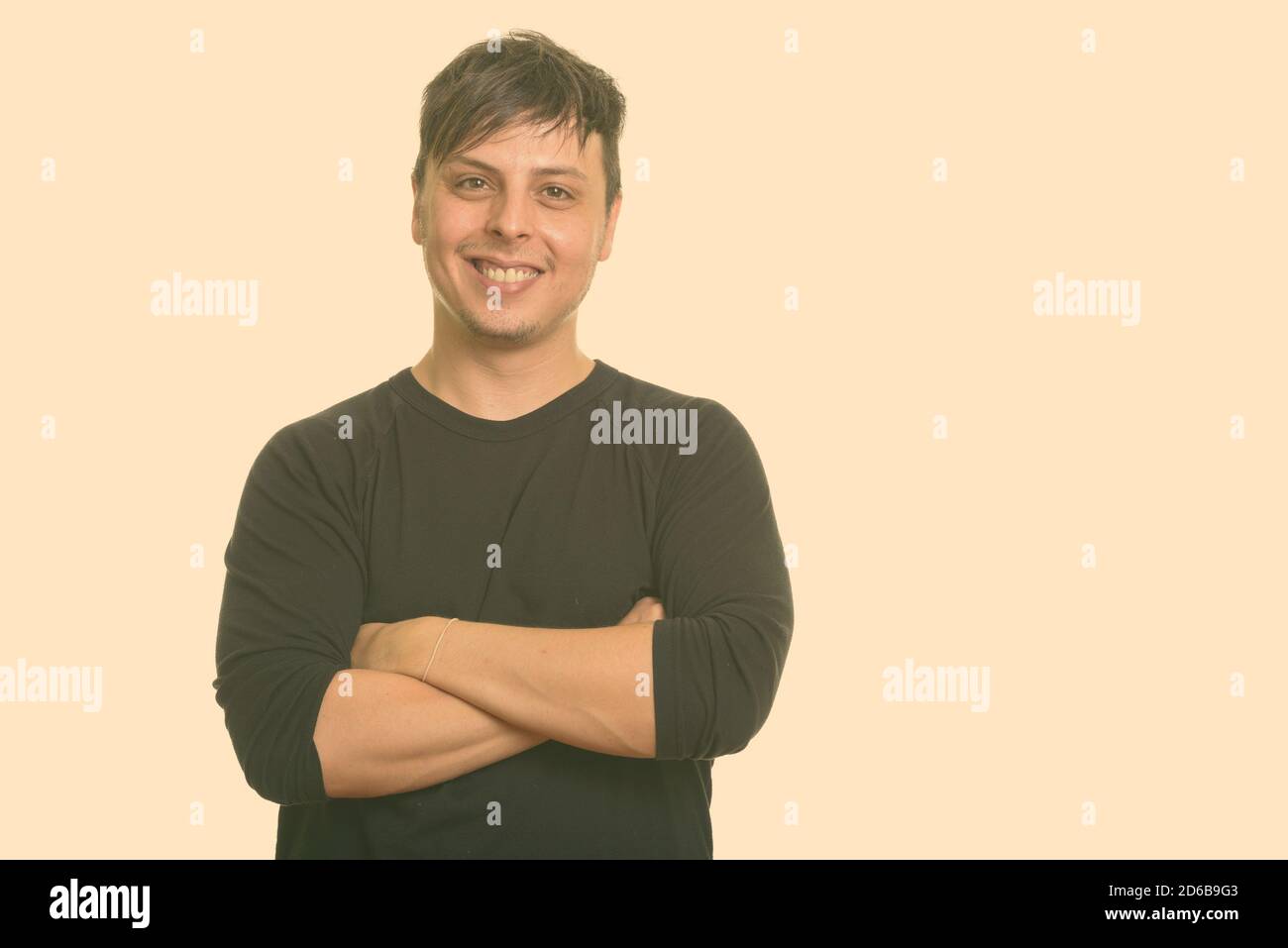 Portrait of happy man smiling with arms crossed Stock Photo - Alamy