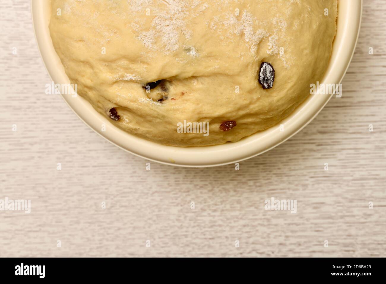 Half a bowl with fermentation rising yeast dough Stock Photo Alamy