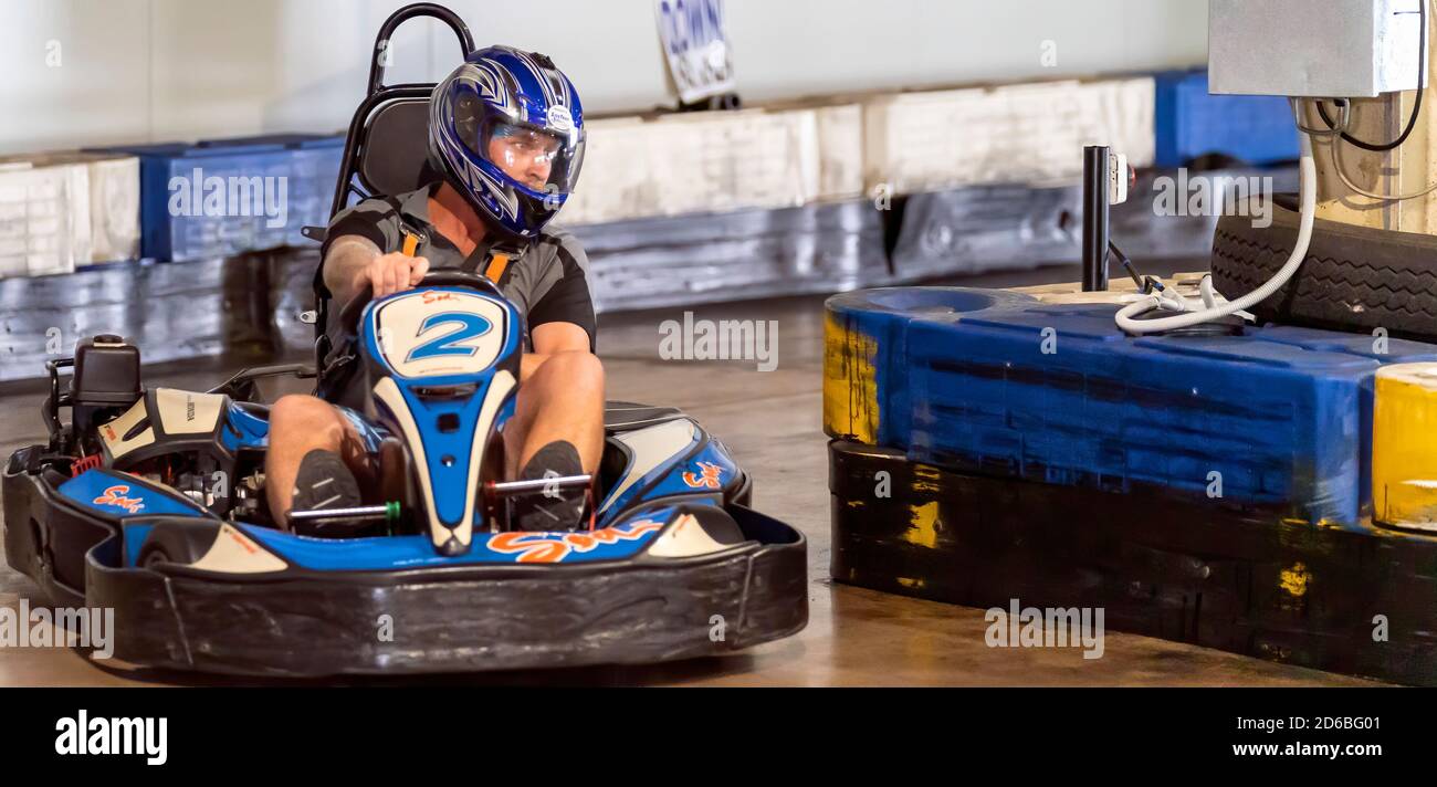Mackay, Queensland, Australia January 2020 A man rides a gokart in