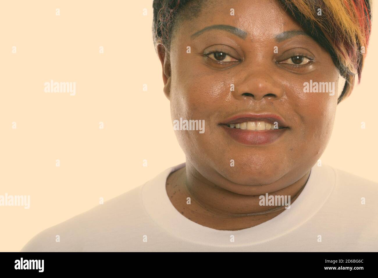 Close up of happy fat black African woman from Congo smiling ready for gym Stock Photo