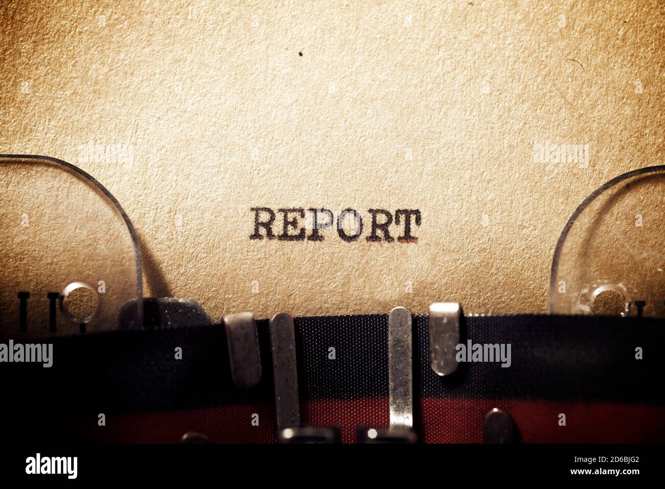 Report word written with a typewriter Stock Photo - Alamy