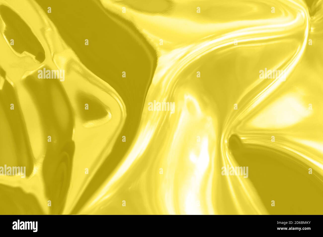 Abstract trendy yellow colored blurred metallic background Stock Photo