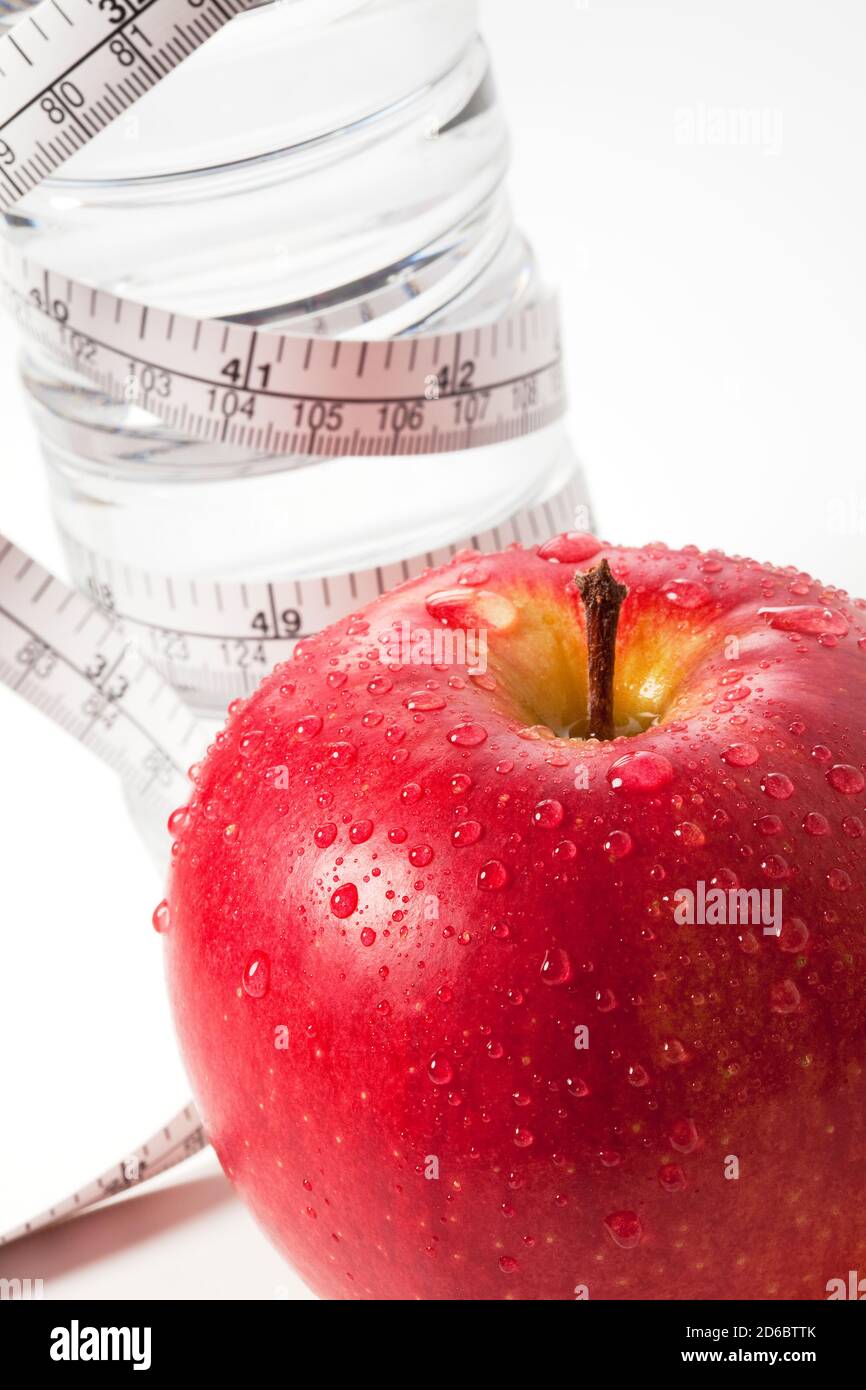Diet concept - apple and measuring tape isolated on white Stock Photo ...