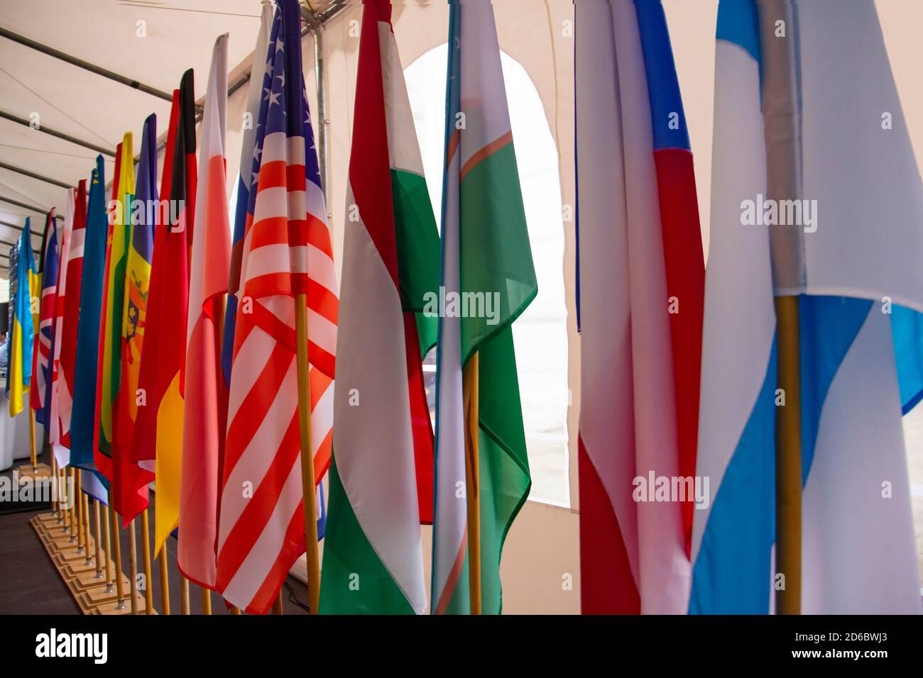 Background from flags of different countries, arranged in a row diagonally. Stock Photo