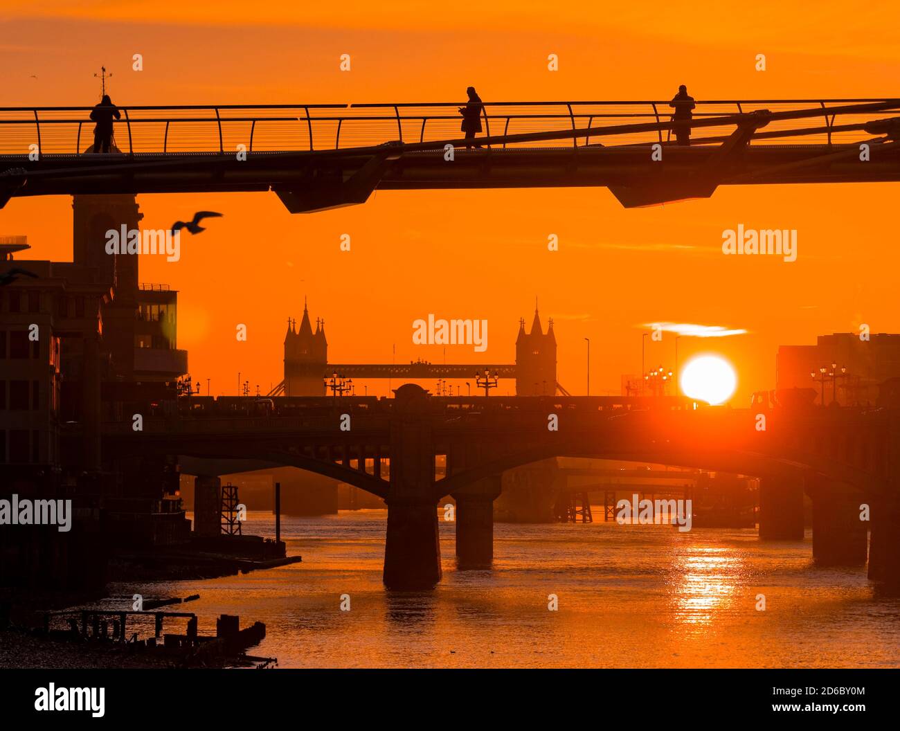 Sunrise over The River Thames and The Millennium Bridge, London, England Stock Photo