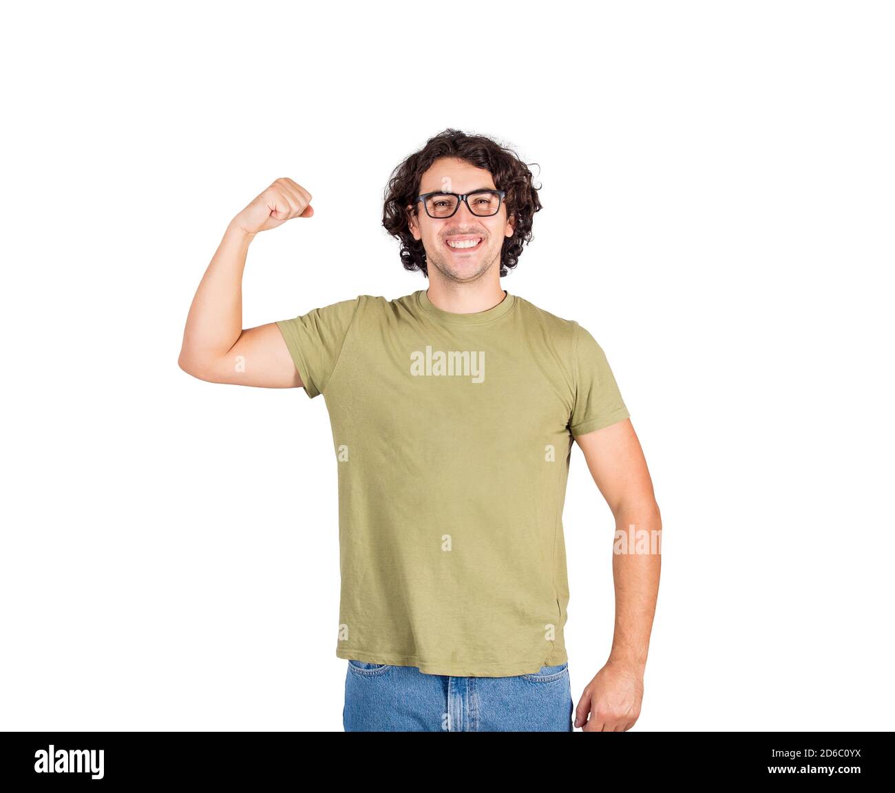 Joyful young man flexing one hand biceps, imagine superpower. Nerd guy wears eyeglasses shows his muscle strength, smiling positive to camera. Persona Stock Photo
