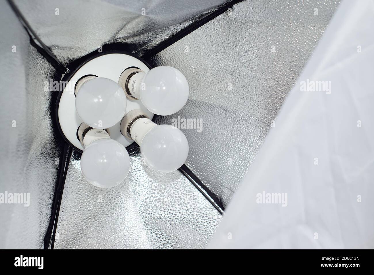 closeup view of studio light bulb on softbox. this equipment uses for