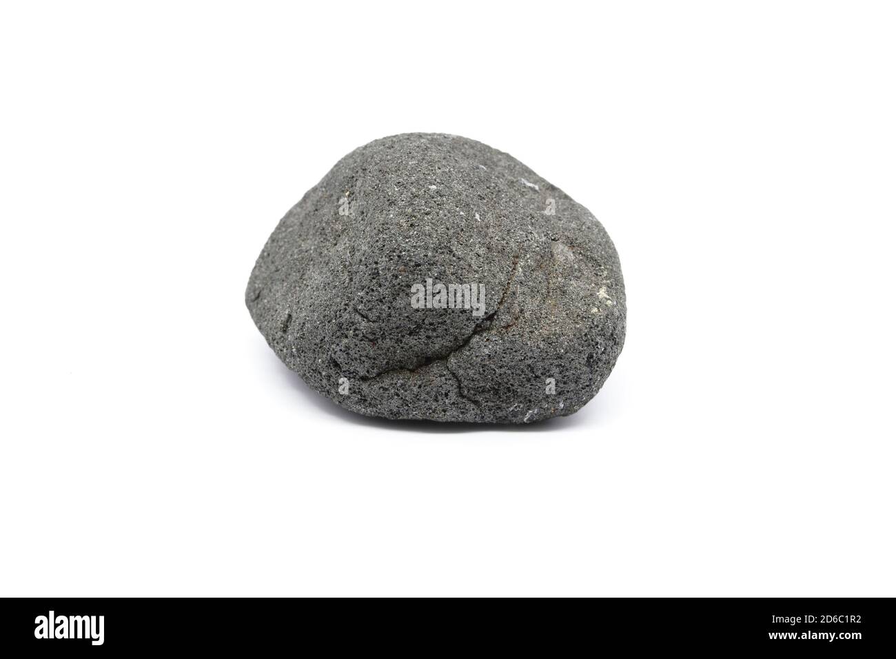 Lava stone stone.Lava stone pebble isolated on white background.Igneous rock. Stock Photo