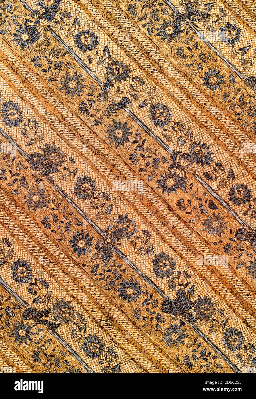 Batik Indonesian: is a technique of wax-resist dyeing applied to whole cloth, or cloth made using this technique originated from Indonesia. Stock Photo