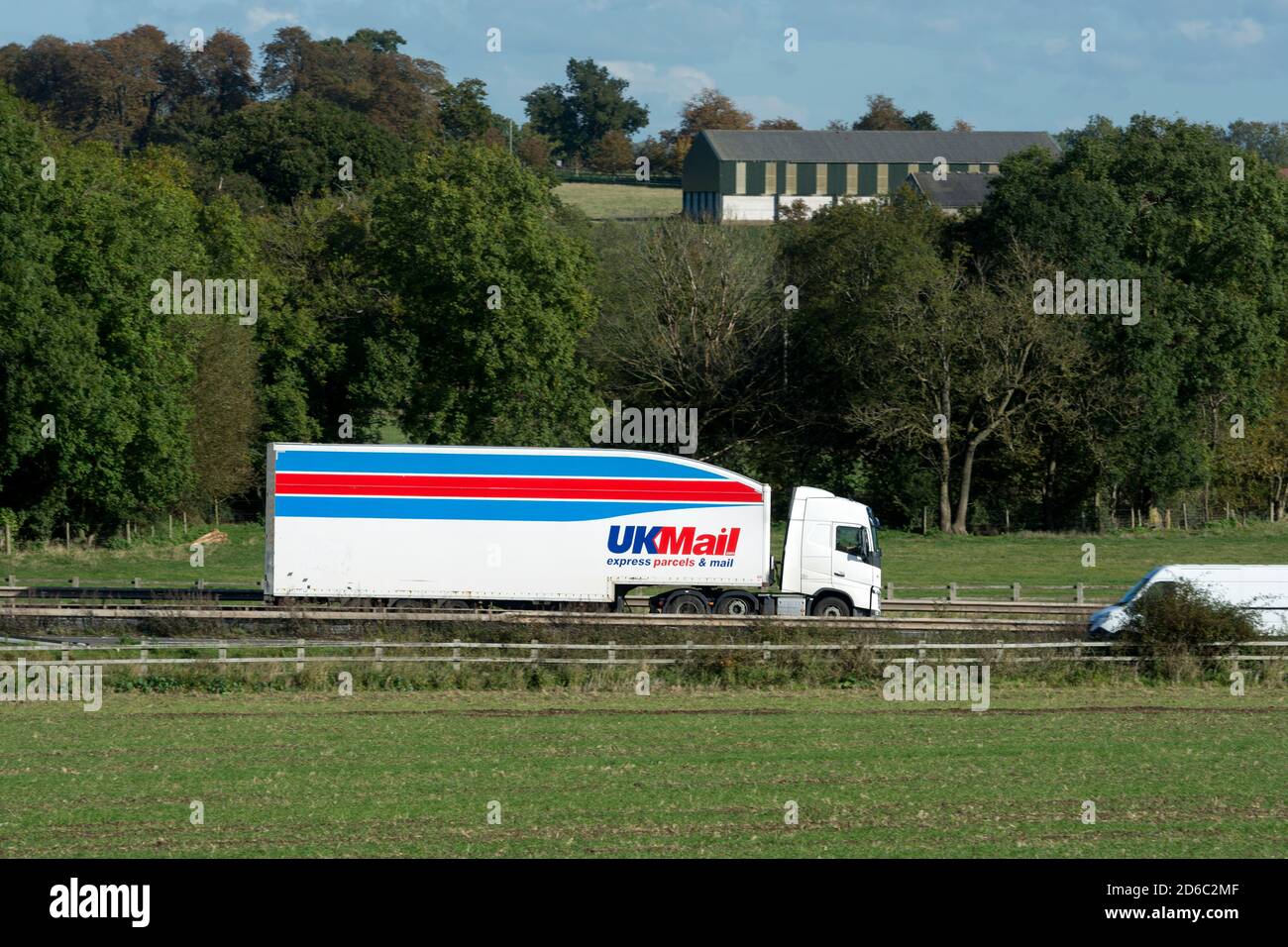 UKMail lorry on the M40 motorway, Warwickshire, UK Stock Photo