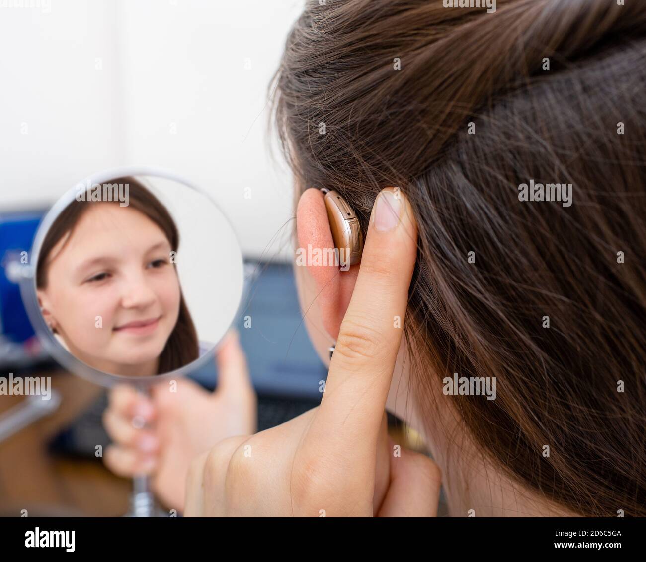 Advertising hearing aid for children, a caucasian race child showing a